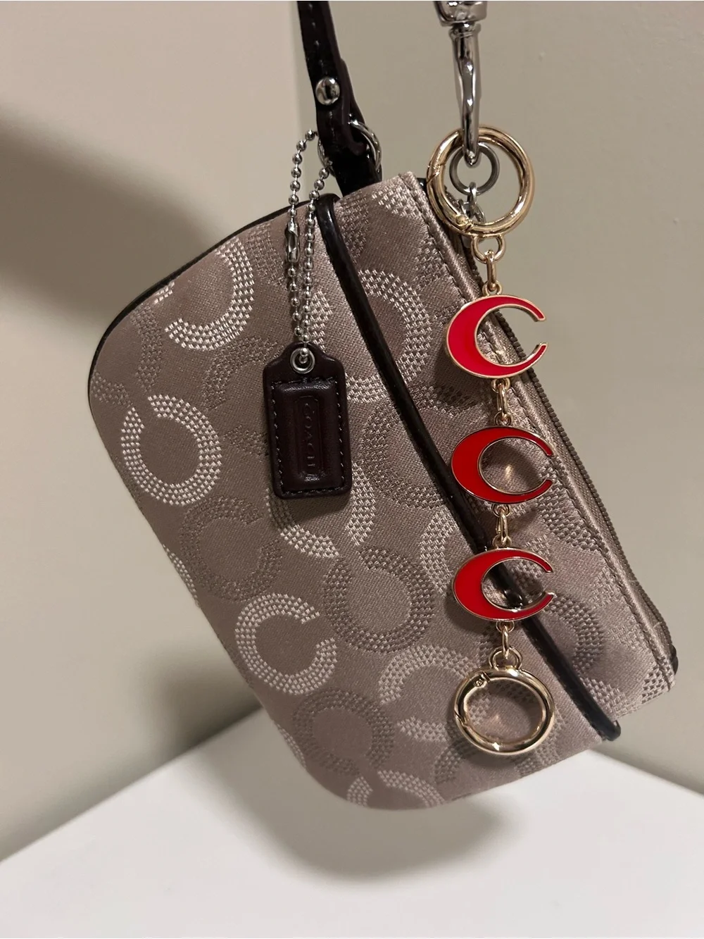 Coach Taupe Signature Canvas Wristlet with Red Charm Accents